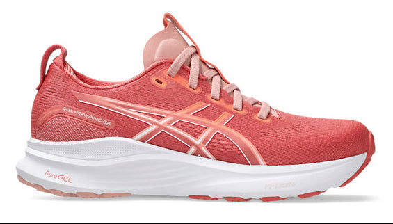 Pink running shoe with white sole on a white background