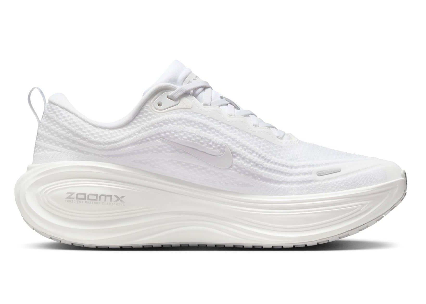 White running shoe with 'ZoomX' branding on a white background