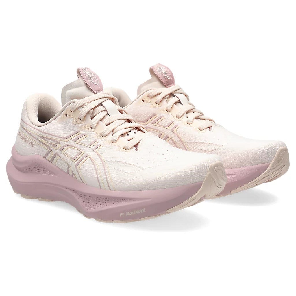 Pair of pink running shoes on a white background