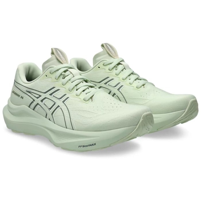 Light green running shoes with brand logo on a white background