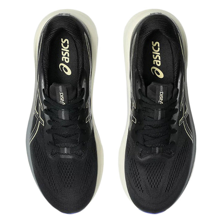 Black Asics running shoes on a white background
