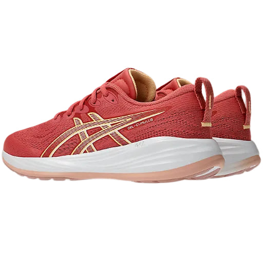 Red running shoe with white sole on a white background