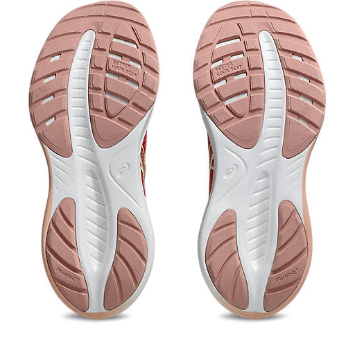 Close-up of pink and white shoe soles on a white background