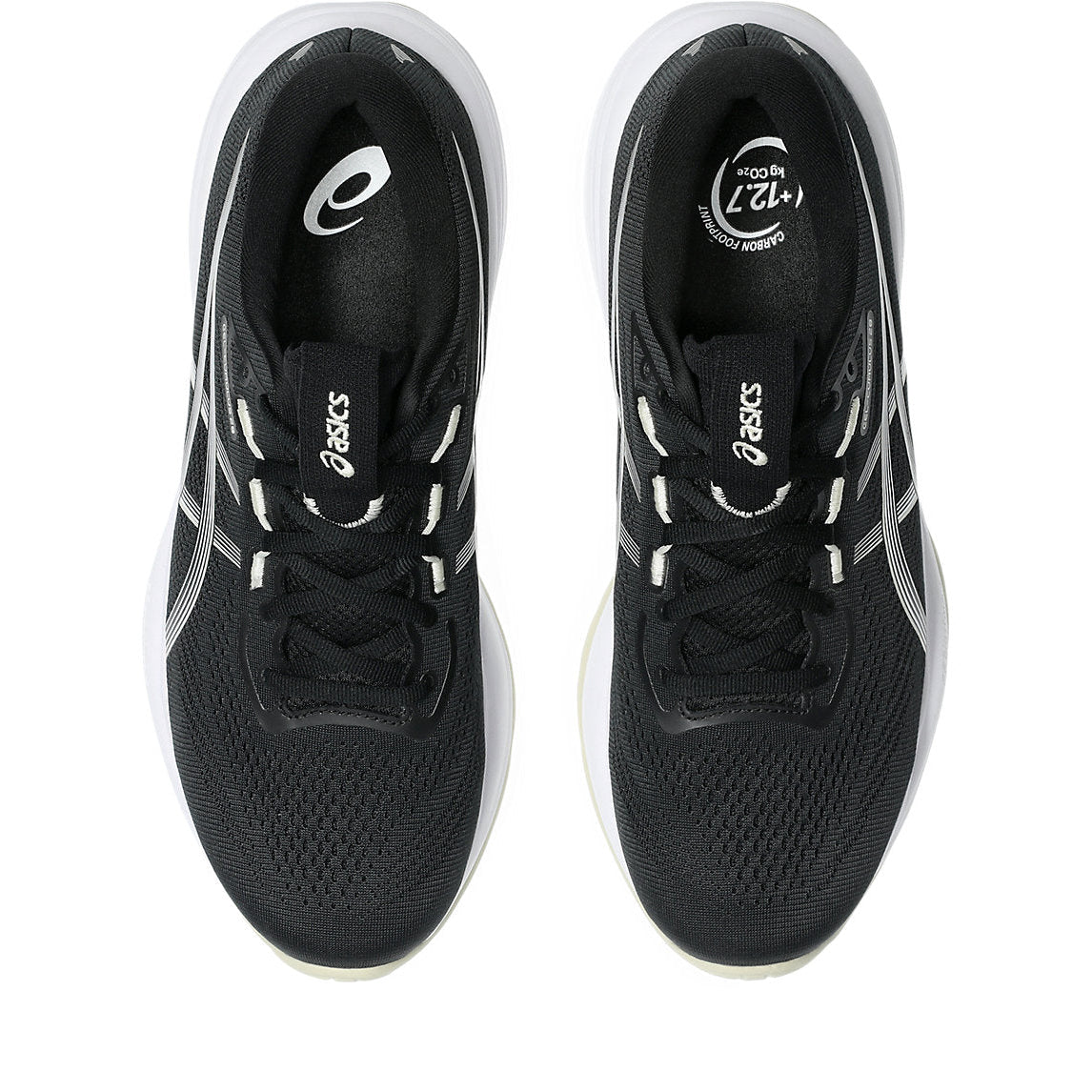 Black running shoes with white accents on a white background