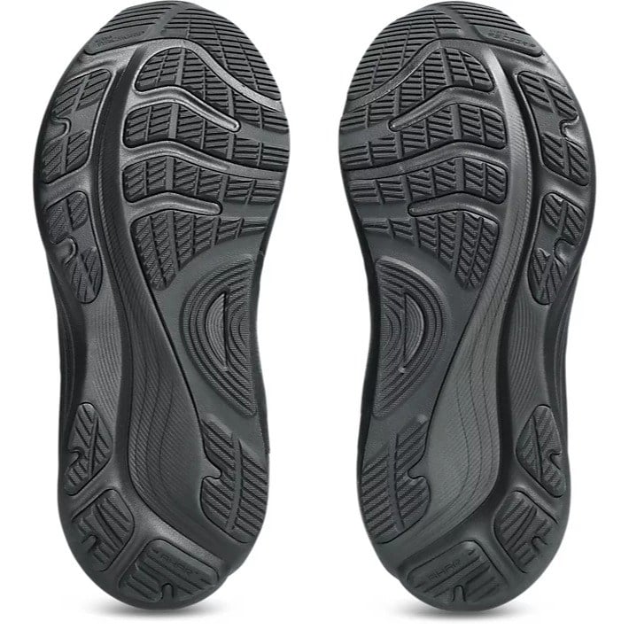 Black shoe sole with tread pattern on a white background