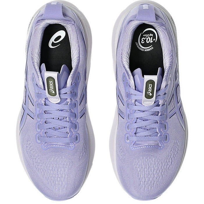 Pair of lavender running shoes with Asics logo on a white background