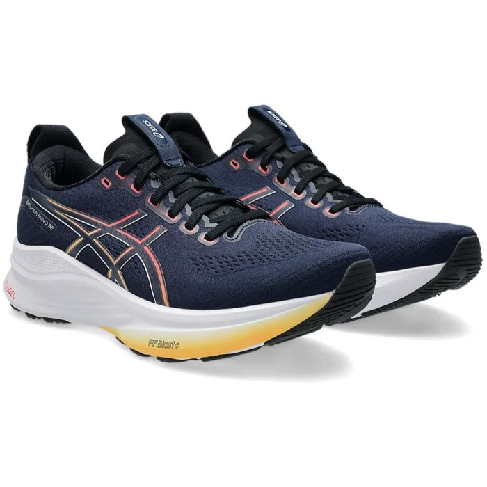 Navy running shoes with black and white accents on a white background