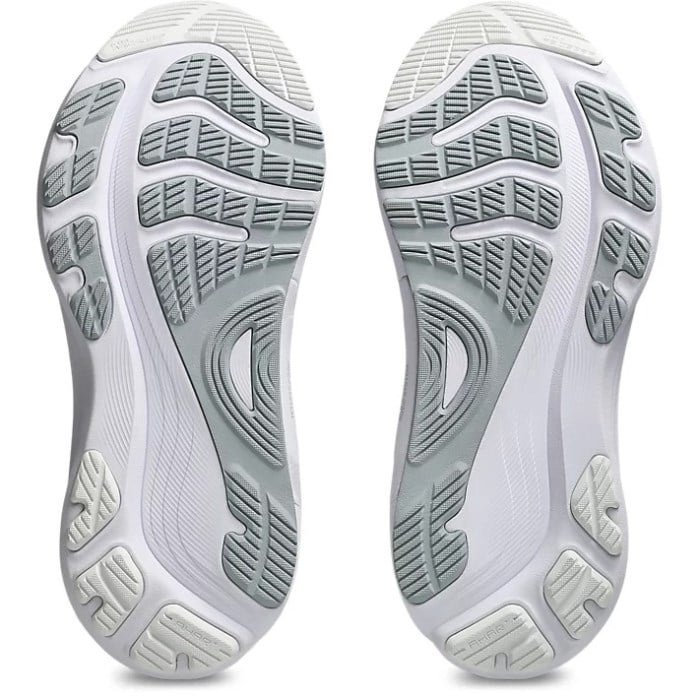 White athletic shoes with sole design on a white background