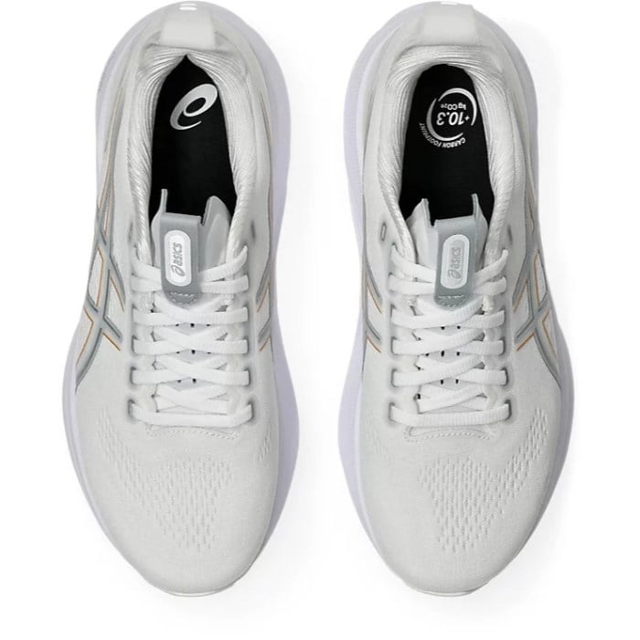 White running shoes with brand logos on a white background