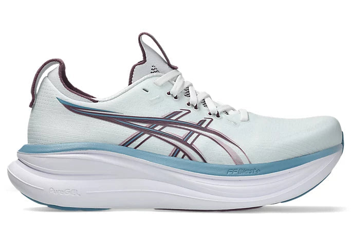 Light blue running shoe with a white sole on a white background