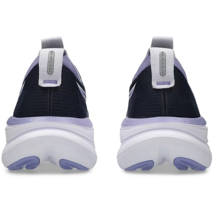 Black and purple athletic shoes with white soles on a white background