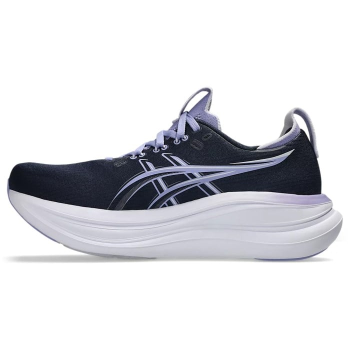 Navy running shoe with white sole on a white background