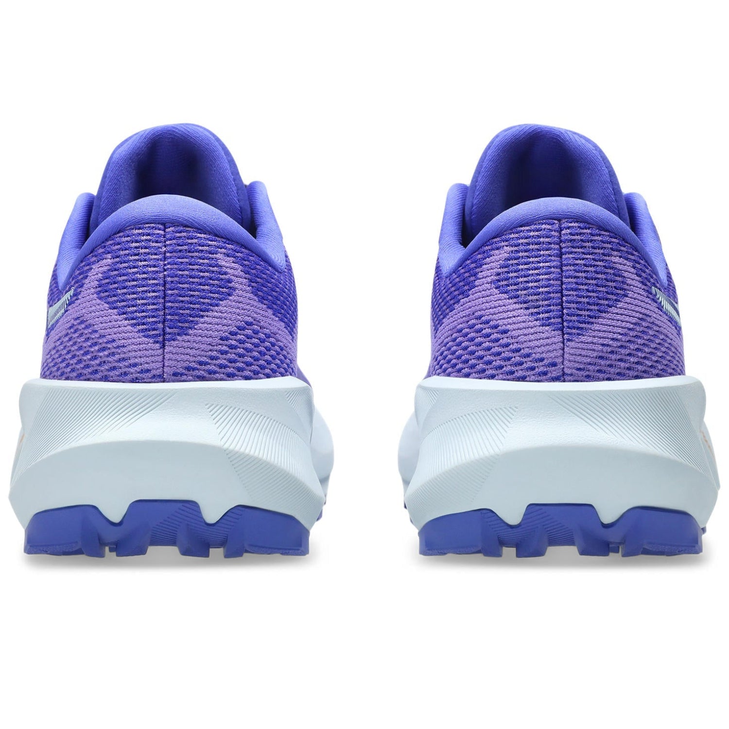Purple running shoes with white soles on a white background