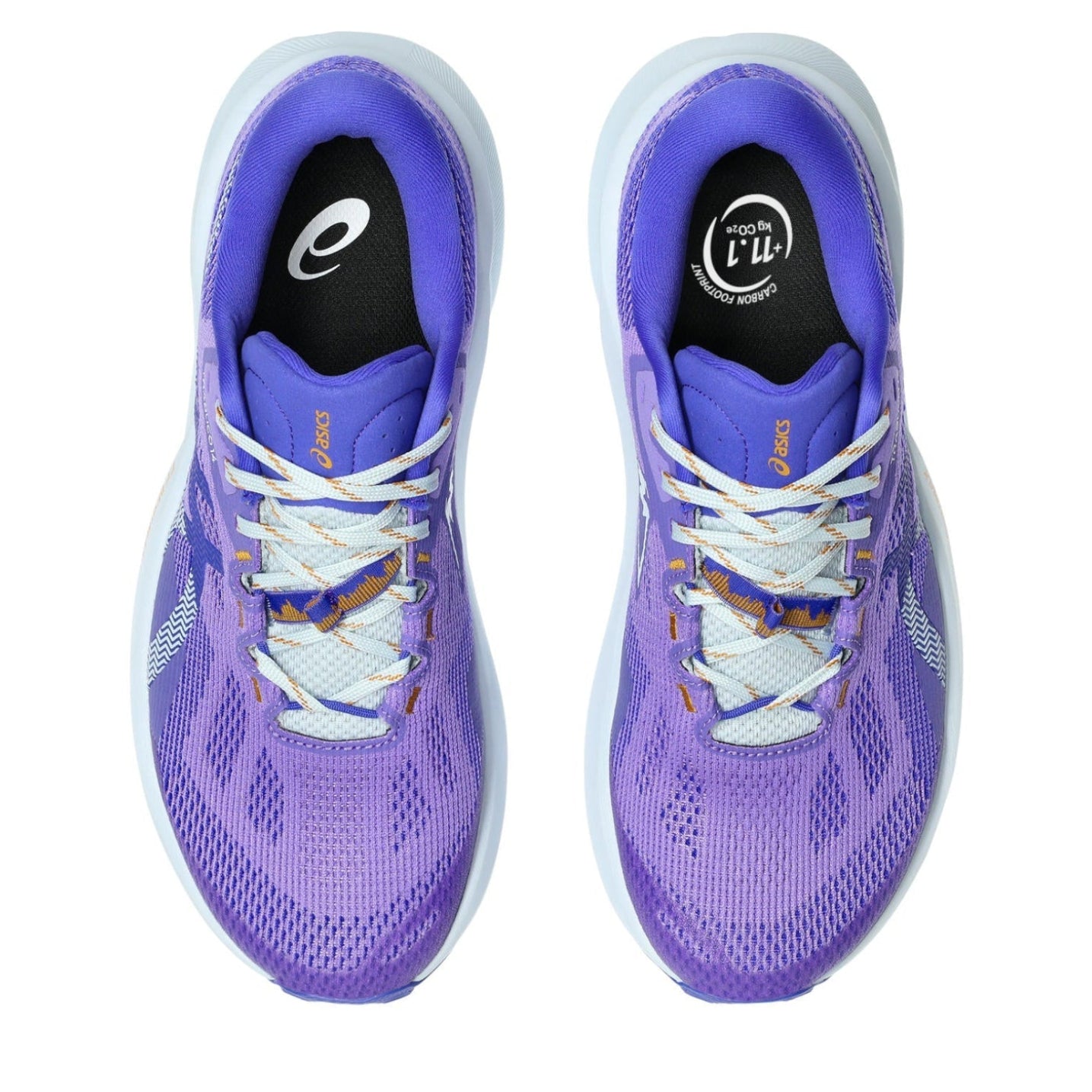 Purple running shoes with white soles on a white background