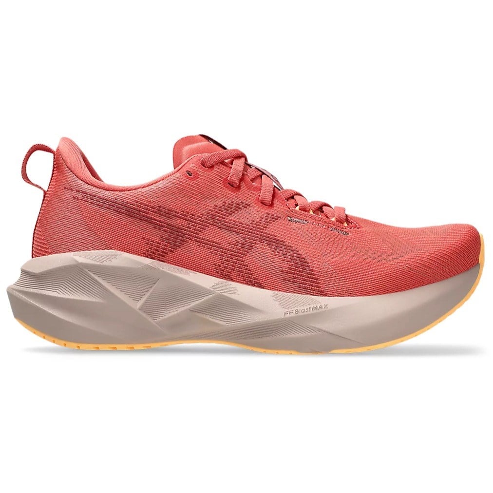 Red running shoe with a beige sole on a white background