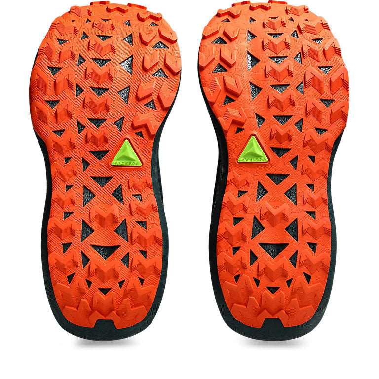 Asics Trabuco Max 4 trail running shoe with a green and orange color scheme, featuring a trail-specific design and cushioning technology.