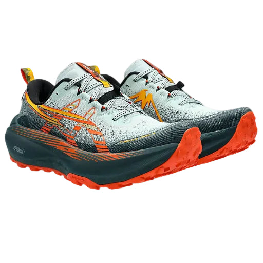 Asics Trabuco Max 4 trail running shoe with a green and orange color scheme, featuring a trail-specific design and cushioning technology.