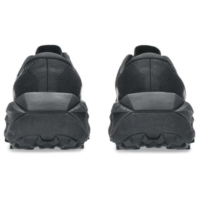Black athletic shoes with textured sole on a white background