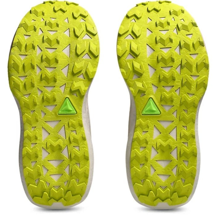 Close-up of bright green sole pattern with triangular凸起物 on a white background