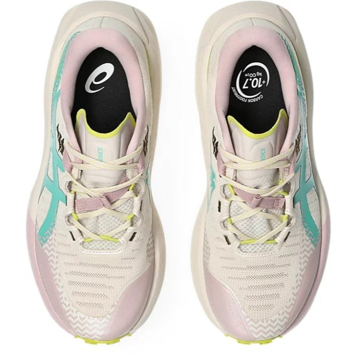Pair of running shoes with a white, pink, and blue design on a white background