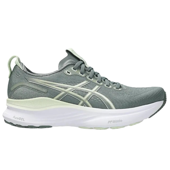 Gray running shoe with white sole on a white background