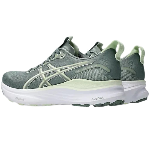 Gray running shoe with white sole on a white background
