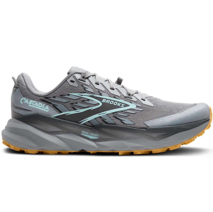 Gray running shoe with yellow sole on a white background