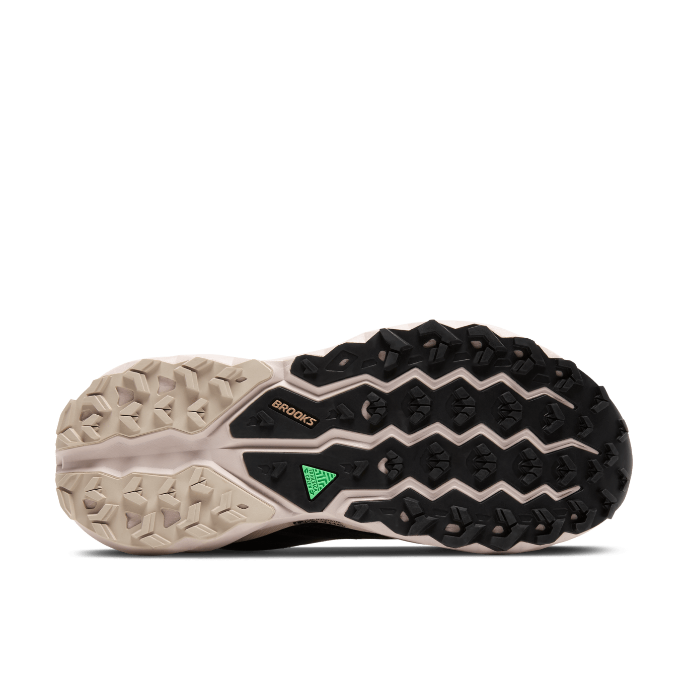 Close-up of a running shoe sole with tread pattern and brand logo on a green background