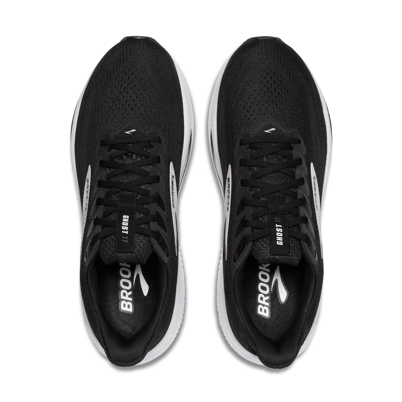 Black running shoes with white accents on a transparent background