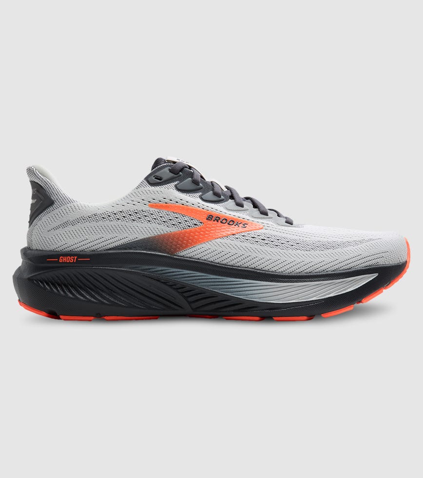 Gray running shoe with orange accents on a light gray background
