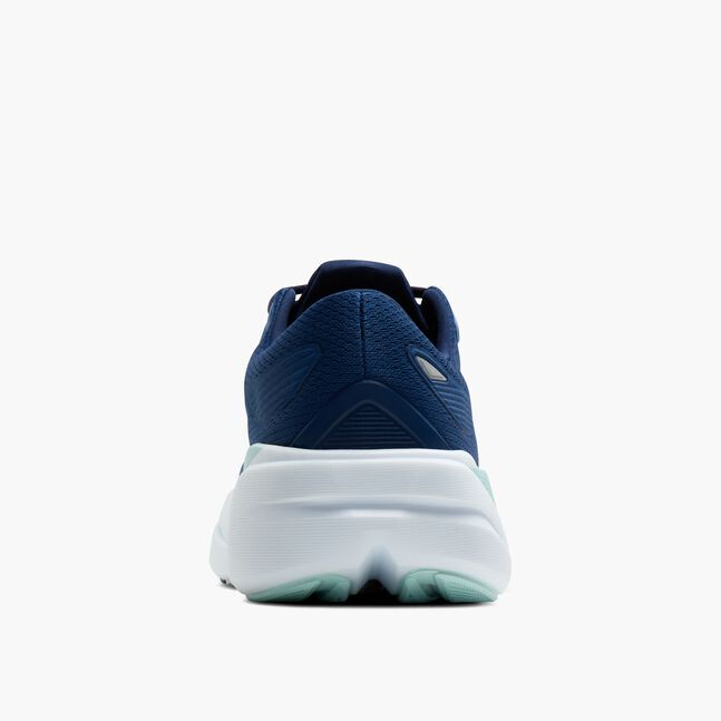 Navy running shoe with white sole on a light gray background
