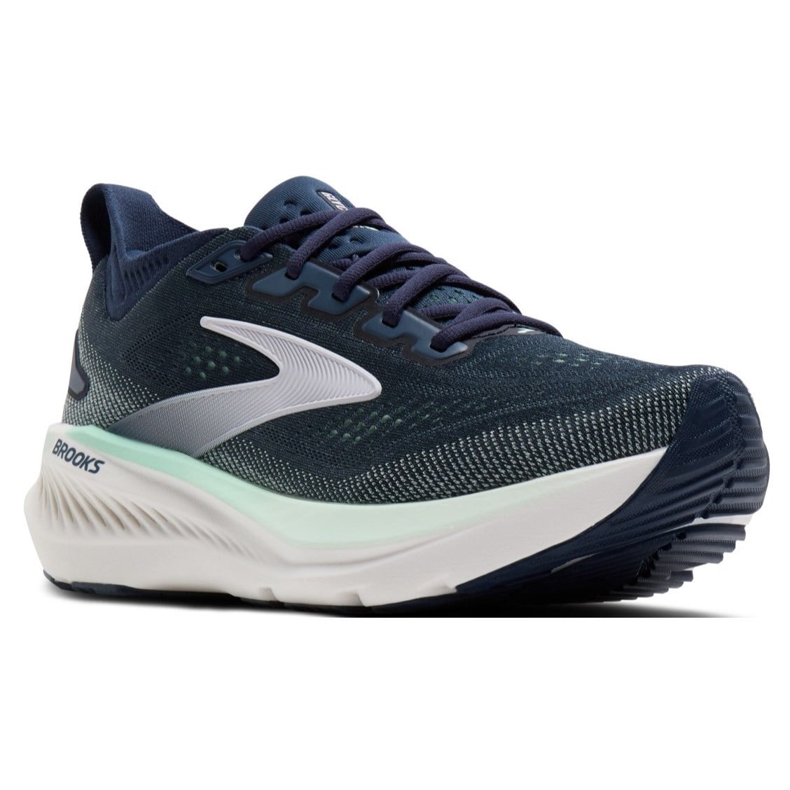 Navy running shoe with white sole on a white background