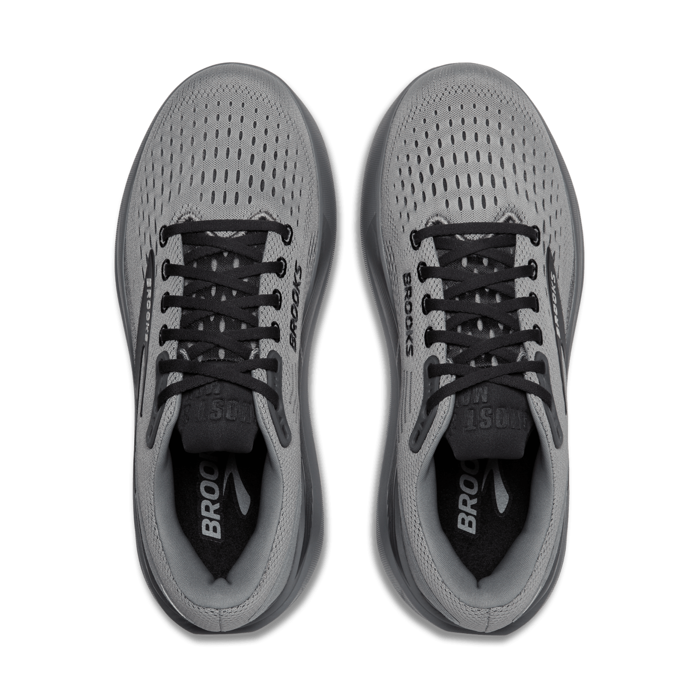 Gray running shoes with black laces on a transparent background