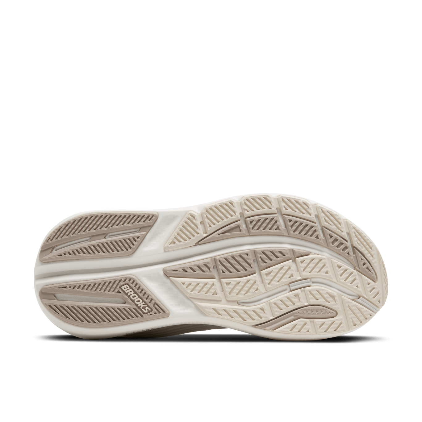 Close-up of a running shoe sole with 'Brooks' branding on a green background