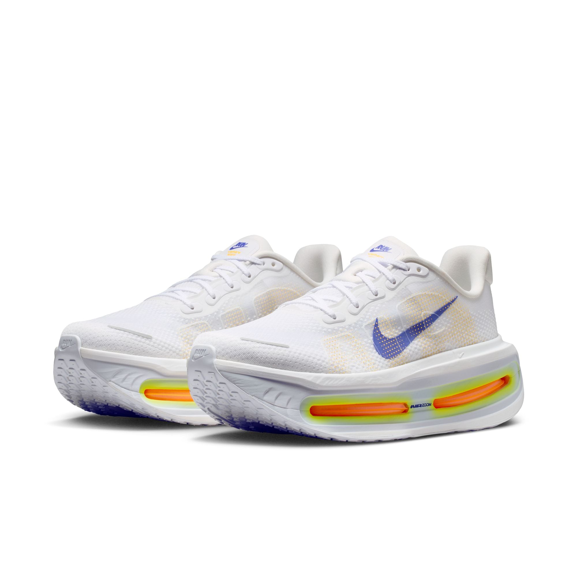 White shoe with blue, yellow orange accents on white background