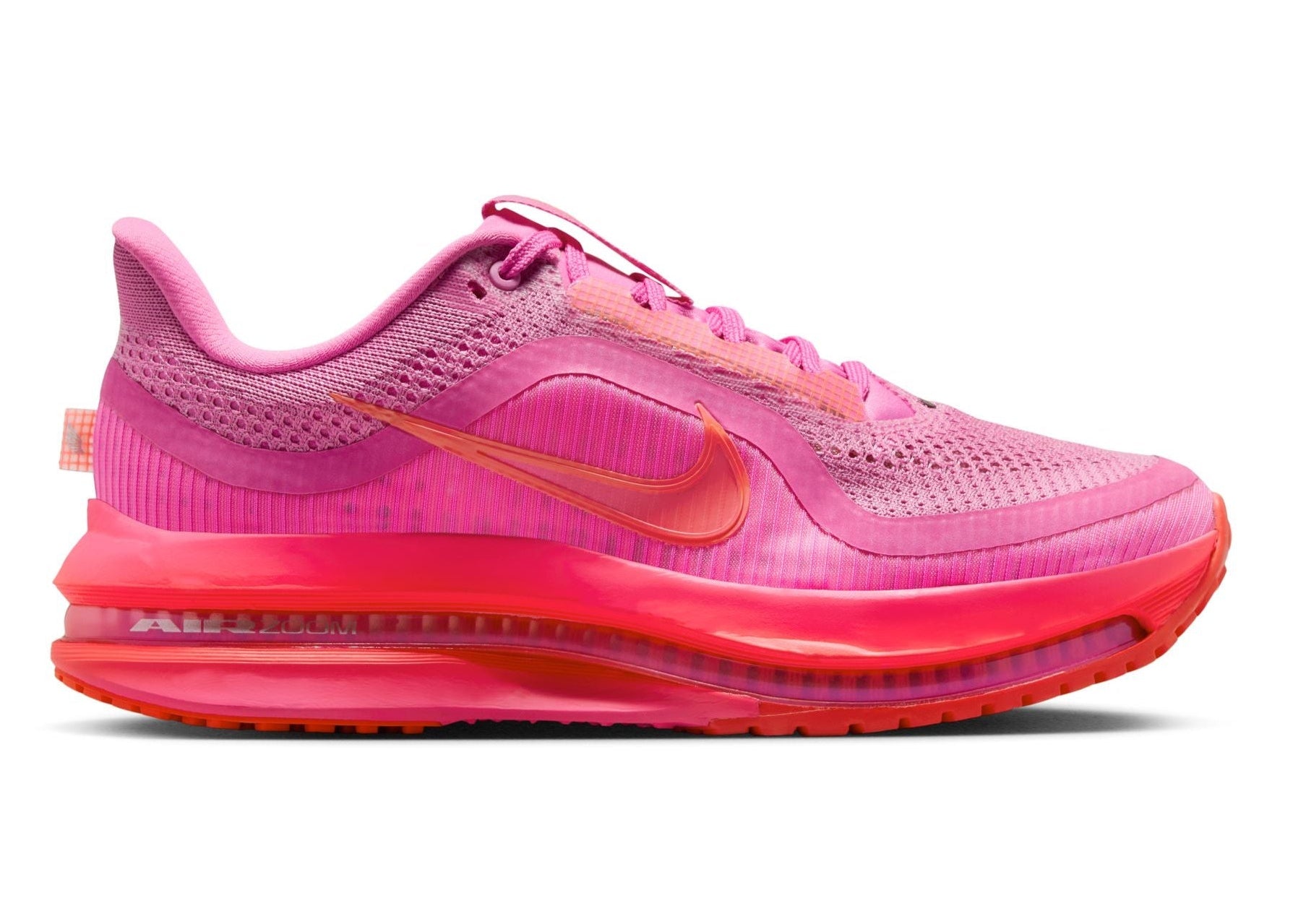 Pink sneaker with a visible brand logo on a white background