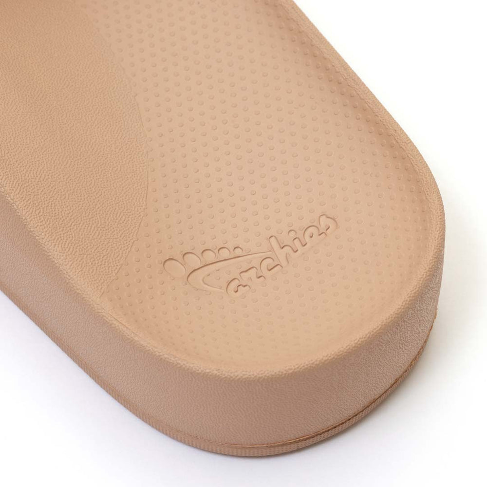 Close-up of a beige sandal sole with 'Zara' branding on a white background