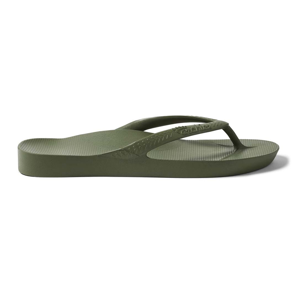 Green sandal with a strap on a white background