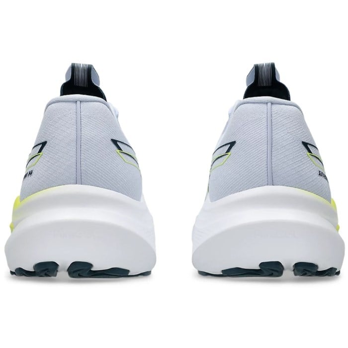Gray running shoes with black and yellow accents on a white background