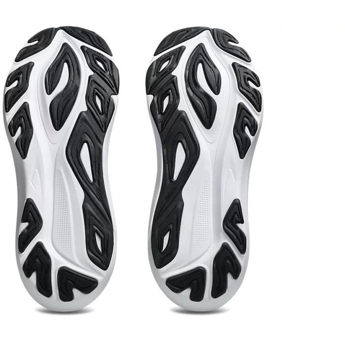 White athletic shoes with black pattern on a white background