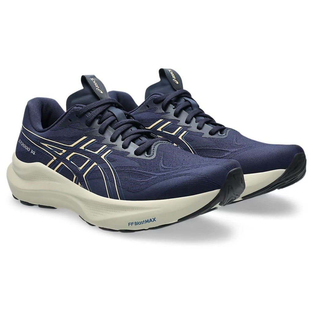 Pair of navy running shoes with white soles on a white background