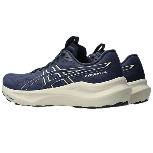 Navy running shoe with white sole on a white background