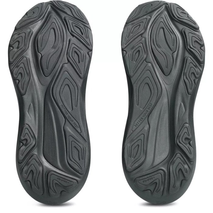 Black shoe sole with unique tread pattern on a white background