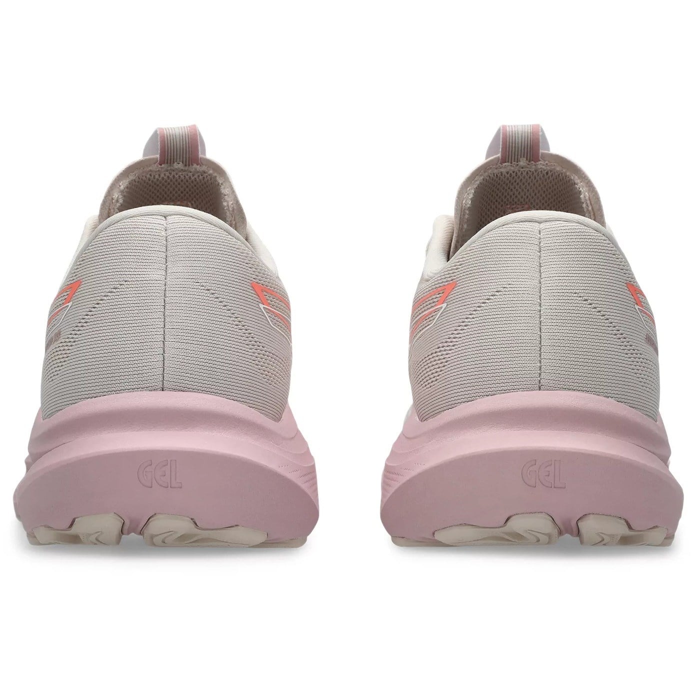 Pair of gray and pink running shoes on a white background