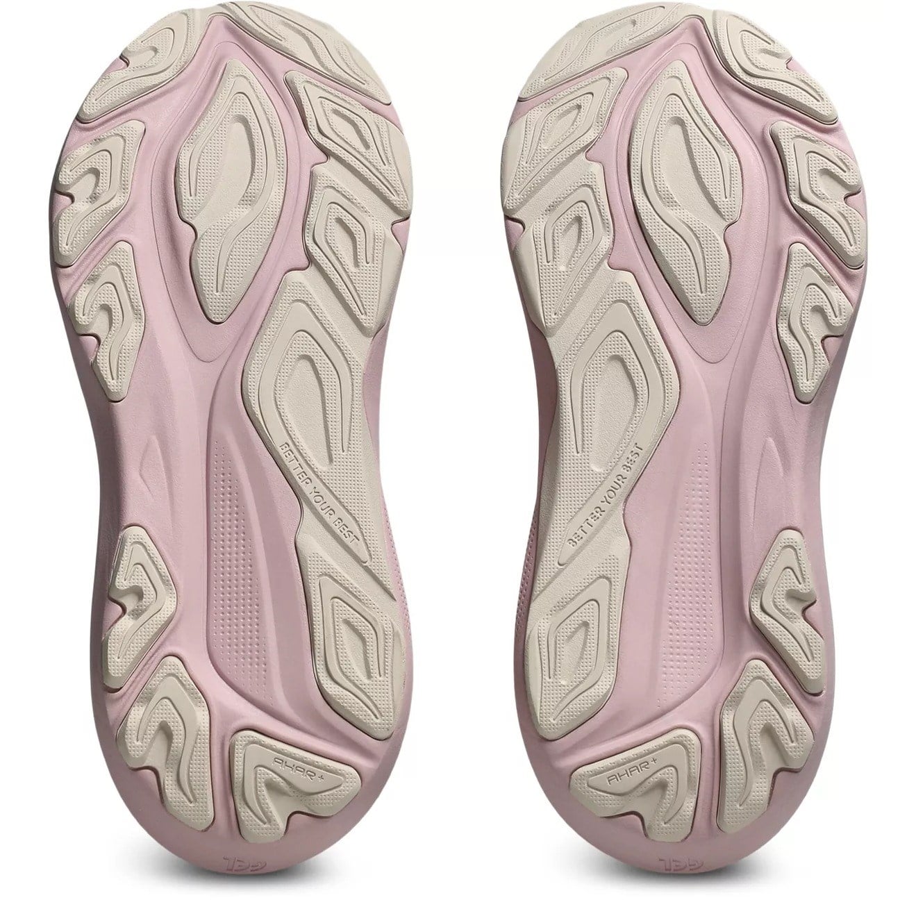 Close-up of pink and beige shoe soles on a white background
