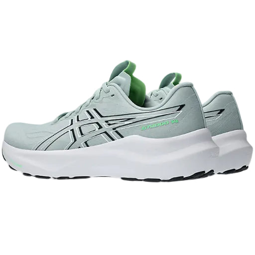 Light gray running shoe with green accents on a white background