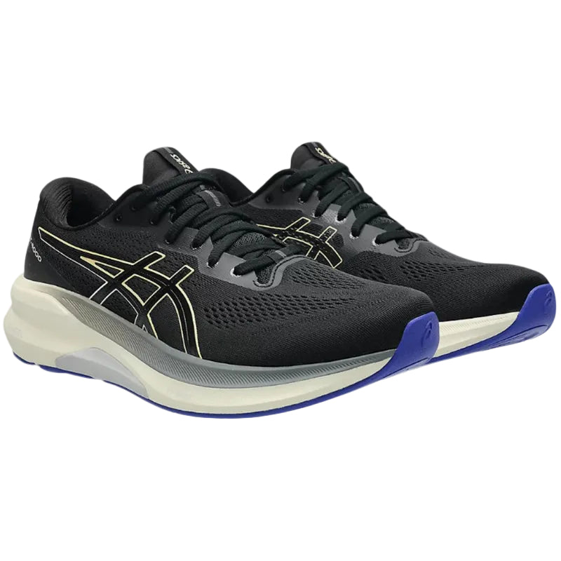 Black running shoes with blue soles on a white background