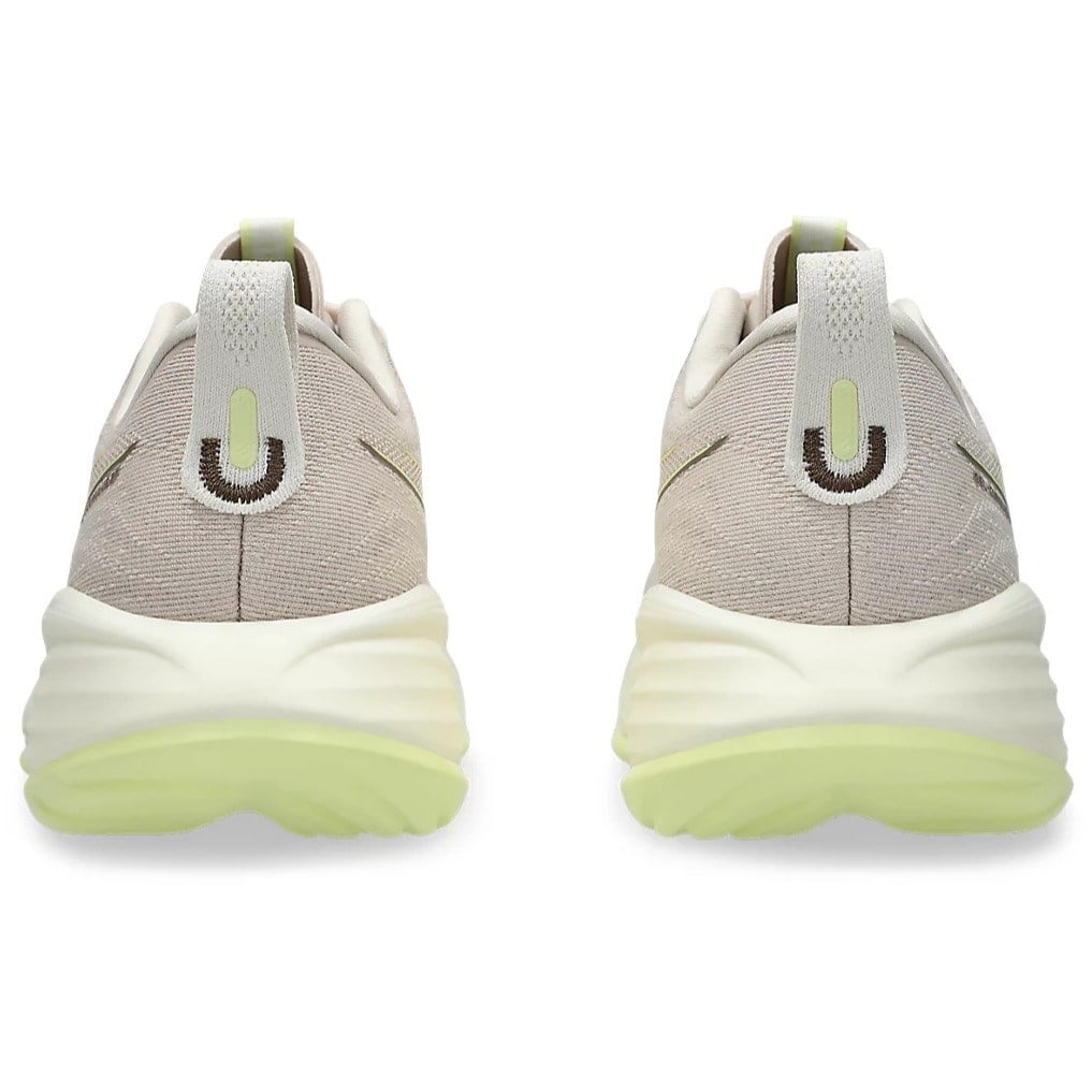 Pair of gray and green sneakers on a white background