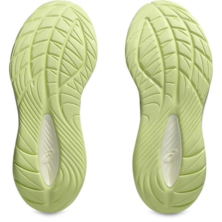 Light green shoe sole with tread pattern on a white background
