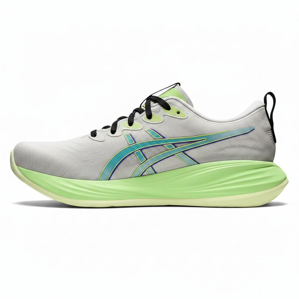 Gray and green running shoe on a white background